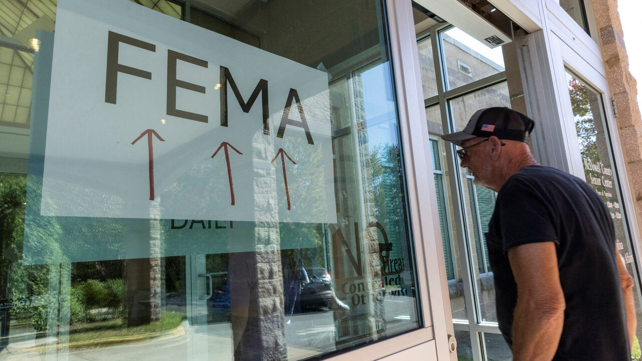 A resident enters a FEMA's improvised station to attend claims by local residents affected by floods following the passing of Hurricane Helene, in Marion, North Carolina, U.S., October 5, 2024. REUTERS/Eduardo Munoz/File Photo