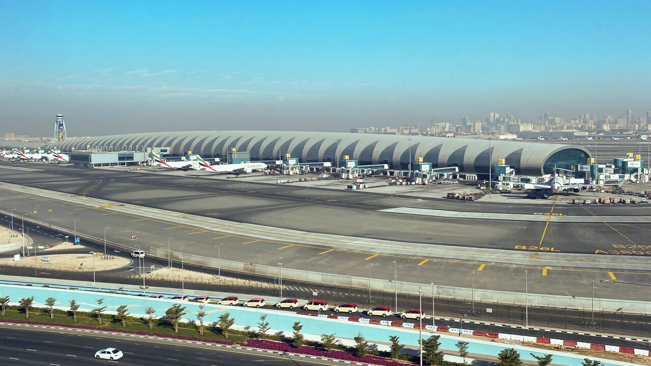 FILE PHOTO: Airliners are seen on the tarmac in a general view of Dubai International Airport in Dubai, United Arab Emirates January 13, 2021. Picture taken through a window. REUTERS/Abdel Hadi Ramahi/File Photo