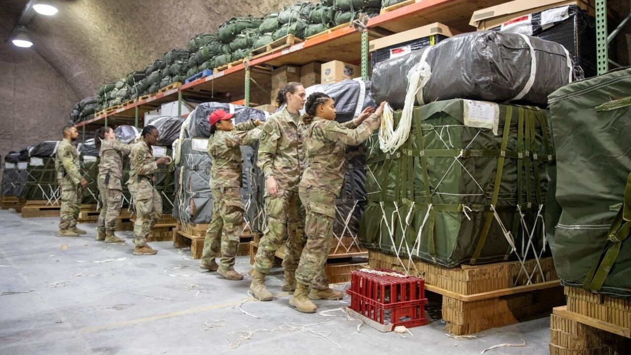 FILE PHOTO: U.S. Air Force members work on the preparation of a humanitarian aid drop for Gaza residents, in this picture released on March 5, 2024. US Central Command via X/Handout via REUTERS/File Photo