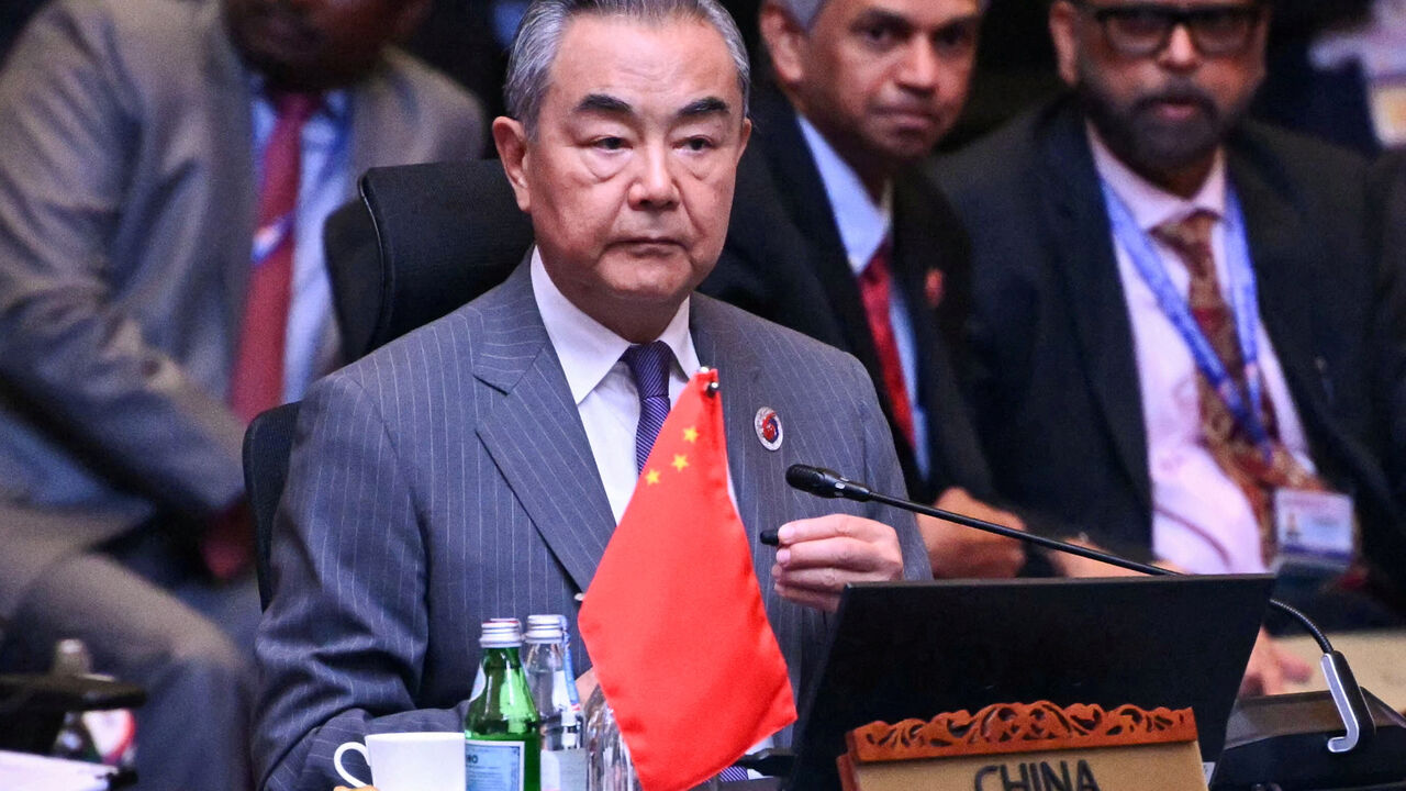FILE PHOTO: China's Foreign Minister Wang Yi attends the 15th East Asia Summit Foreign Ministers’ meeting during the 58th Association of Southeast Asian Nations (ASEAN) Foreign Ministers’ meeting and related meetings at the Convention Centre in Kuala Lumpur on July 11, 2025.     MANDEL NGAN/Pool via REUTERS/File Photo