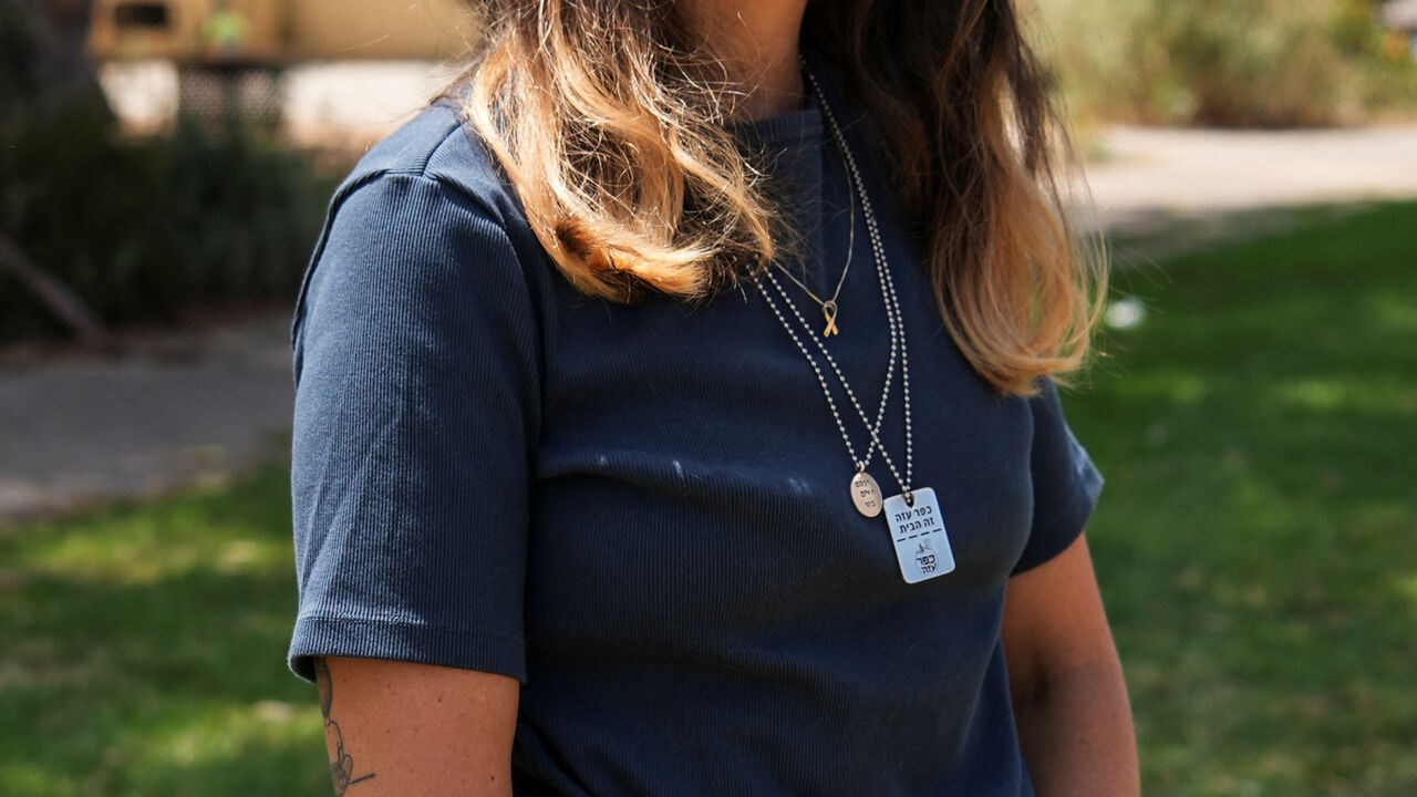 Doron Steinbrecher, a released hostage, who was held by Hamas in Gaza for 471 days, poses for a photograph, following an interview with Reuters, in Kibbutz Shefayim, Israel, August 25, 2025.  REUTERS/Miro Maman