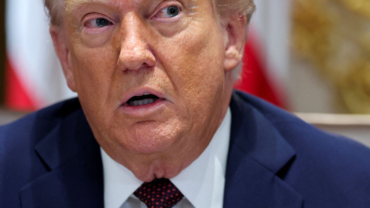 U.S. President Donald Trump attends a cabinet meeting at the White House in Washington, D.C., U.S., August 26, 2025. REUTERS/Jonathan Ernst