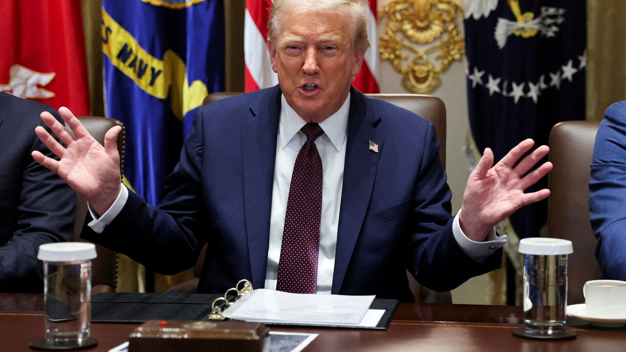 FILE PHOTO: U.S. President Donald Trump gestures during a cabinet meeting at the White House in Washington, D.C., U.S., August 26, 2025. REUTERS/Jonathan Ernst/File photo