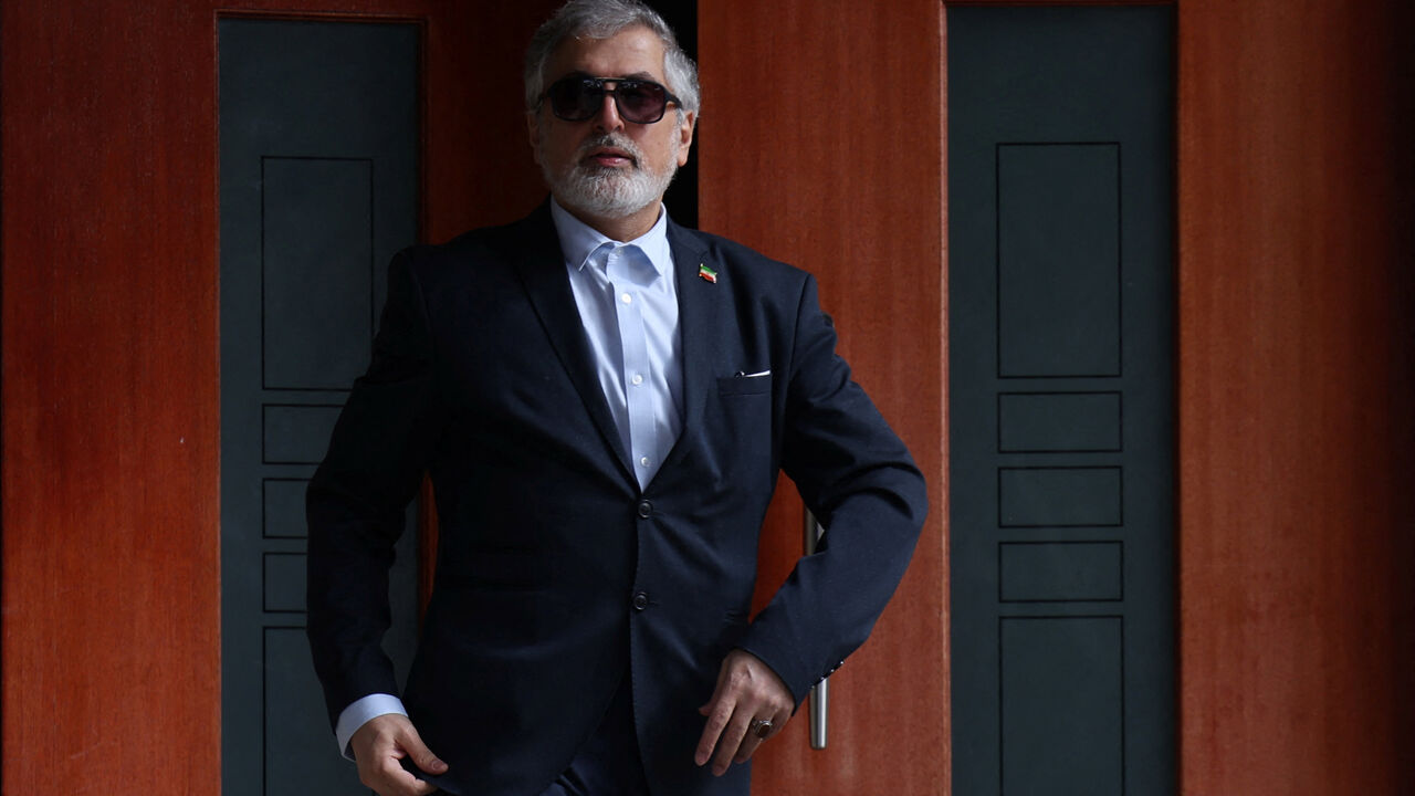 Iranian ambassador to Australia Ahmad Sadeghi stands outside his residence, after being expelled on Tuesday and given seven days to leave the country by Prime Minister Anthony Albanese, who accused Iran of orchestrating at least two antisemitic attacks on Australian soil, in Canberra, Australia, August 28, 2025. REUTERS/Hollie Adams