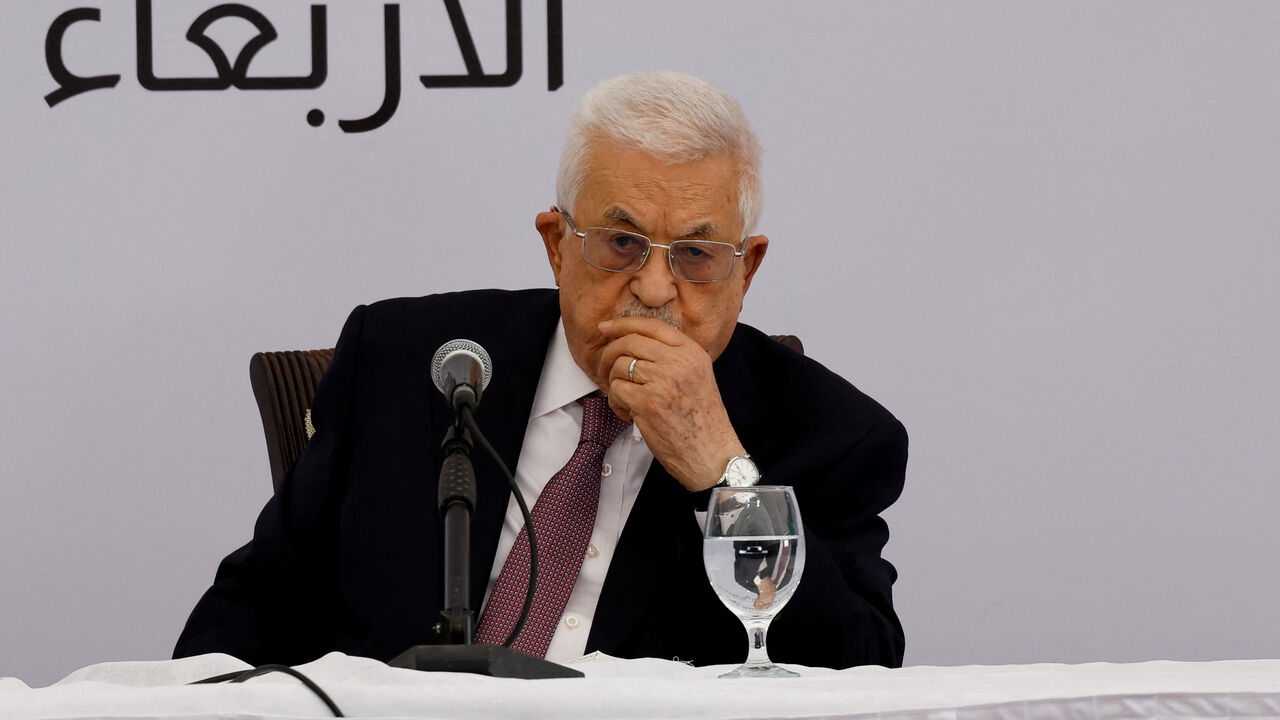 FILE PHOTO: Palestinian President Mahmoud Abbas looks on as he visits the Istishari Cancer Center in Ramallah, in the Israeli-occupied West Bank, May 14, 2025. REUTERS/Mohammed Torokman/File Photo