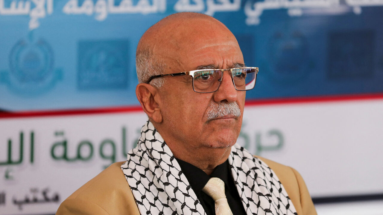 FILE PHOTO: Head of the Houthi-led government Ahmad al-Rahawi looks on during a visit by Houthi government officials to the Hamas office in Sanaa, Yemen August 19, 2024. REUTERS/Khaled Abdullah/File Photo