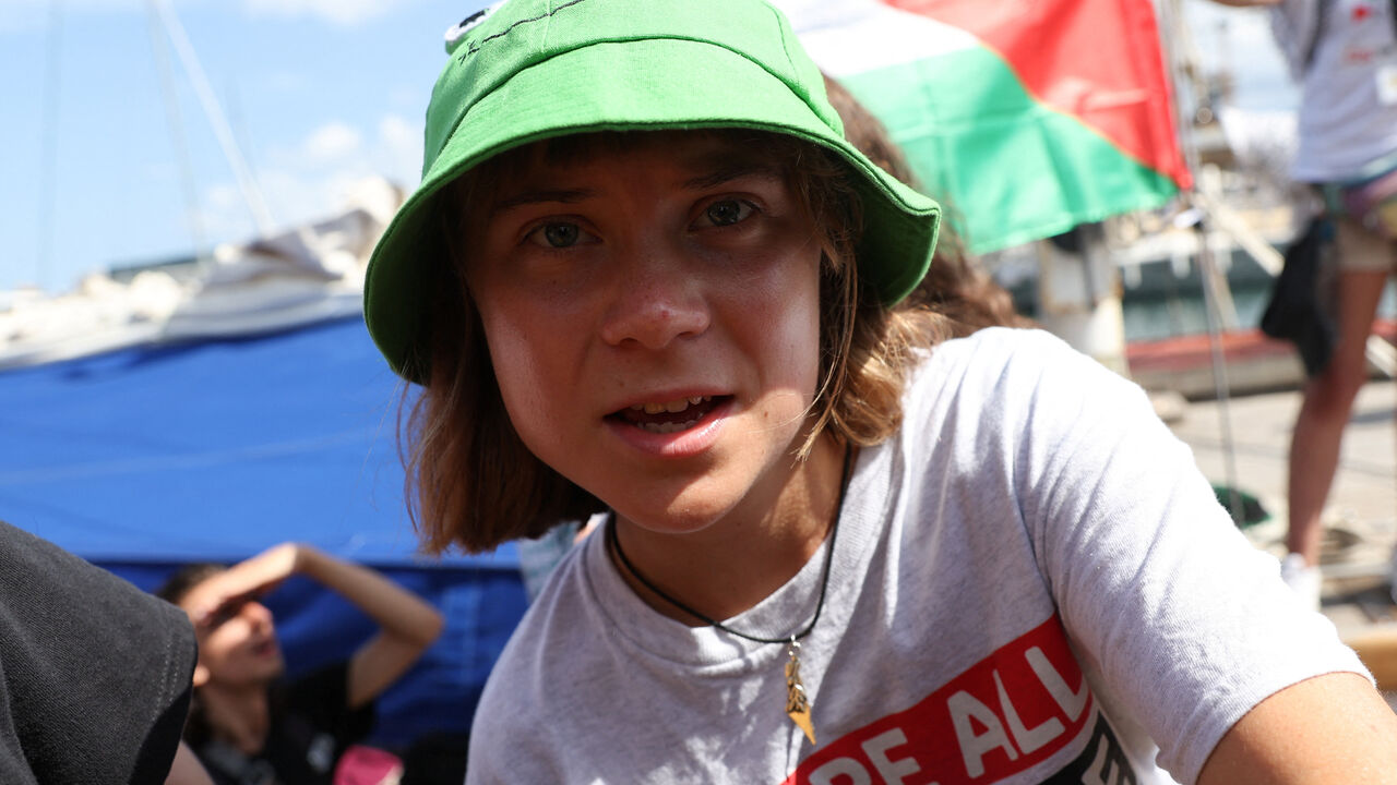 Swedish activist Greta Thunberg prepares for departure with other activists on the Global Sumud Flotilla, a humanitarian expedition to Gaza, at the port of Barcelona, Spain August 31, 2025. REUTERS/Eva Manez