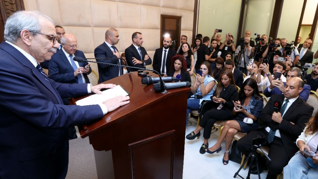 This handout photo released by the Lebanese presidency on August 5, 2025 shows Prime Minister Nawaf Salam speaking to the press after a cabinet session to discuss the issue of disarming Hezbollah 