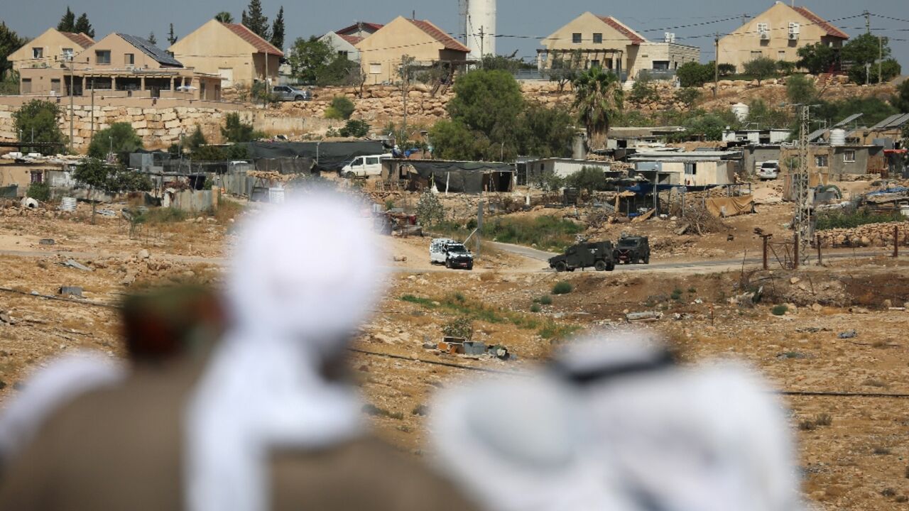 Palestinians say Israel tried to prevent mourners from reaching activist Awdah Hathaleen's funeral