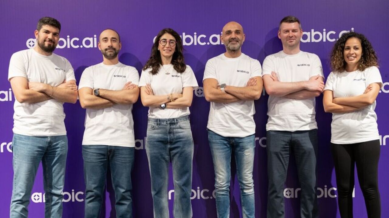 Nour Al Hassan, founder and CEO of Tarjama (C), and members of the Tarjama team promoting Arabic.AI, the firm's new platform offering business solutions in a range of sectors, 2025.