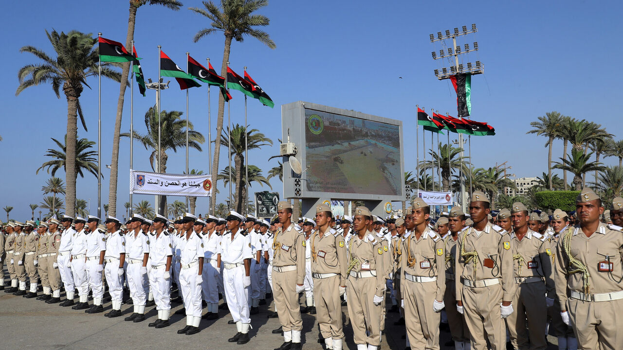 Libyan soldiers take part in a military parade marking the 82nd anniversary of the Libyan army, in the capital Tripoli on Aug. 9, 2022.