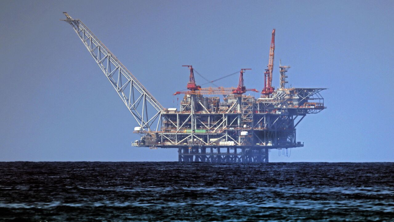 A view of the platform of the Leviathan natural gas field in the Mediterranean Sea is pictured from the Israeli northern coastal beach of Nahsholim, on Aug. 29, 2022.