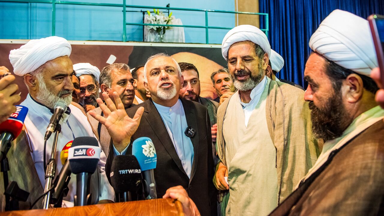 Mohammad Javad Zarif, the former Iranian foreign minister, speaks to supporters during an election rally in support of Iranian presidential election candidate Masoud Pezeshkian in Tehran, Iran, on June 24, 2024.