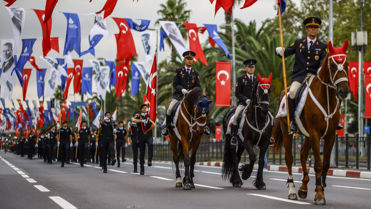 Turkish soldiers march, including some on horses, during a military parade marking the 102nd anniversary of the Victory Day at Vatan Street in Istanbul on Aug. 30, 2024. 