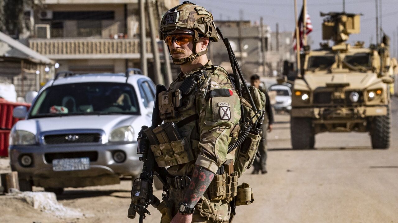 US soldiers patrol in Syria's northeastern city Qamishli, in the Hasakah province, mostly controlled by Kurdish-led Syrian Democratic Forces, on Jan. 9, 2025. 
