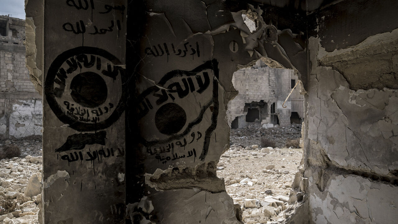 A grafitti on a wall in Tadamon that depicts the flag of the ISIS. Tadamon, Syria, on Feb. 7, 2025. 