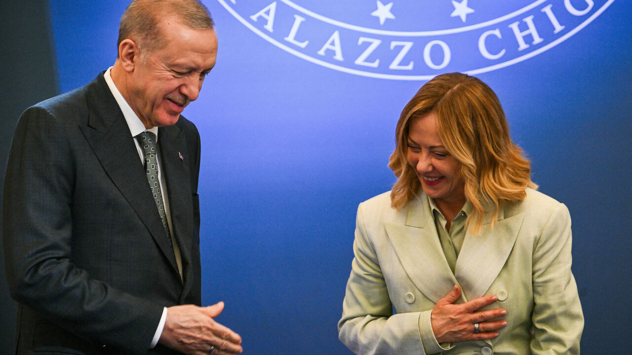 Turkey's President Recep Tayyip Erdogan (L) and Italy's Prime Minister Giorgia Meloni react during a press conference as part of Turkey's President's visit at the Villa Doria Pamphili in Rome on April 29, 2025. Turkish President arrived in Rome for talks with Italy's Prime Minister on April 29, 2025, as the two Mediterranean countries seek to boost trade and cooperation, and will discuss the war in Ukraine and the "situation in the Middle East" before a summit where government ministers are expected to sign