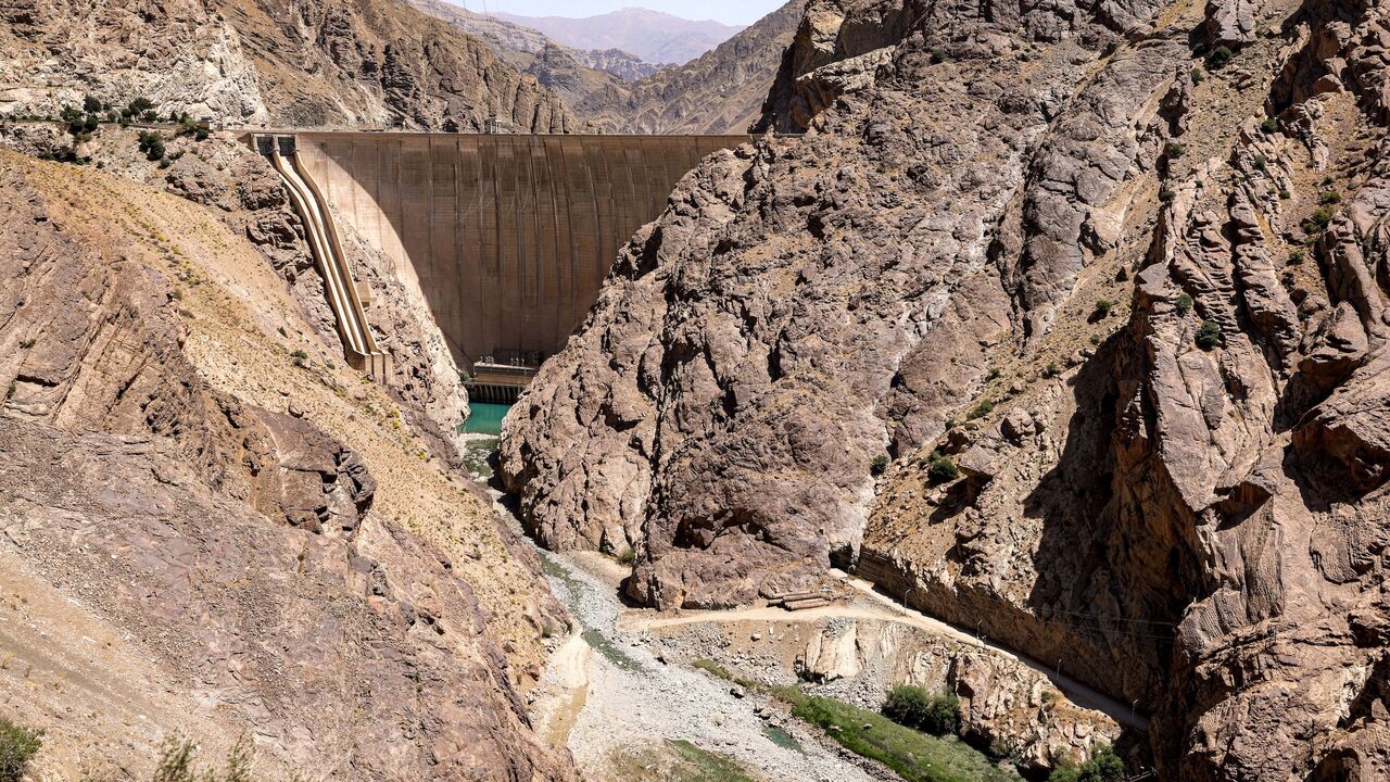 The Amir Kabir dam and its outflow along the Karaj River in Iran's northern Alborz mountain range are pictured on June 1, 2025. 