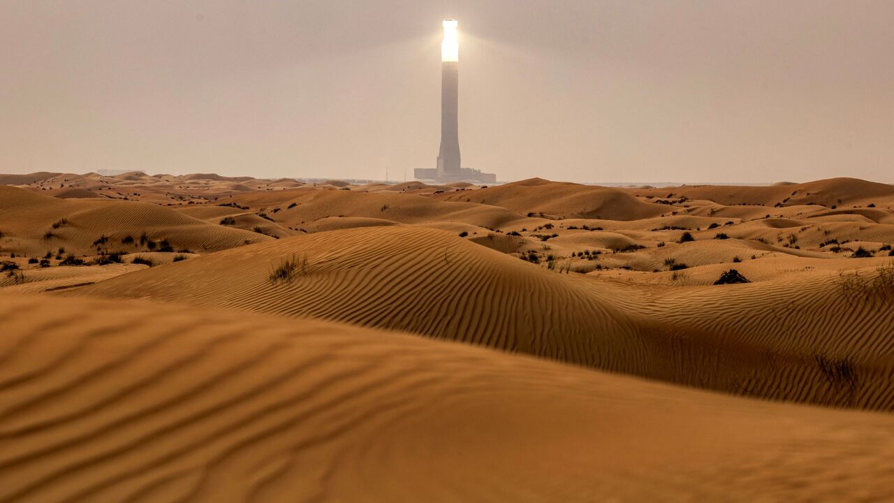 The tallest solar power tower in the world at 260 metres is pictured at the concentrated solar thermal power (CST) Noor Energy 1 solar complex at Mohammed bin Rashid al-Maktoum Solar Park, about 50 kilometres south of Dubai, on July 19, 2025. (Photo by FADEL SENNA / AFP) (Photo by FADEL SENNA/AFP via Getty Images)