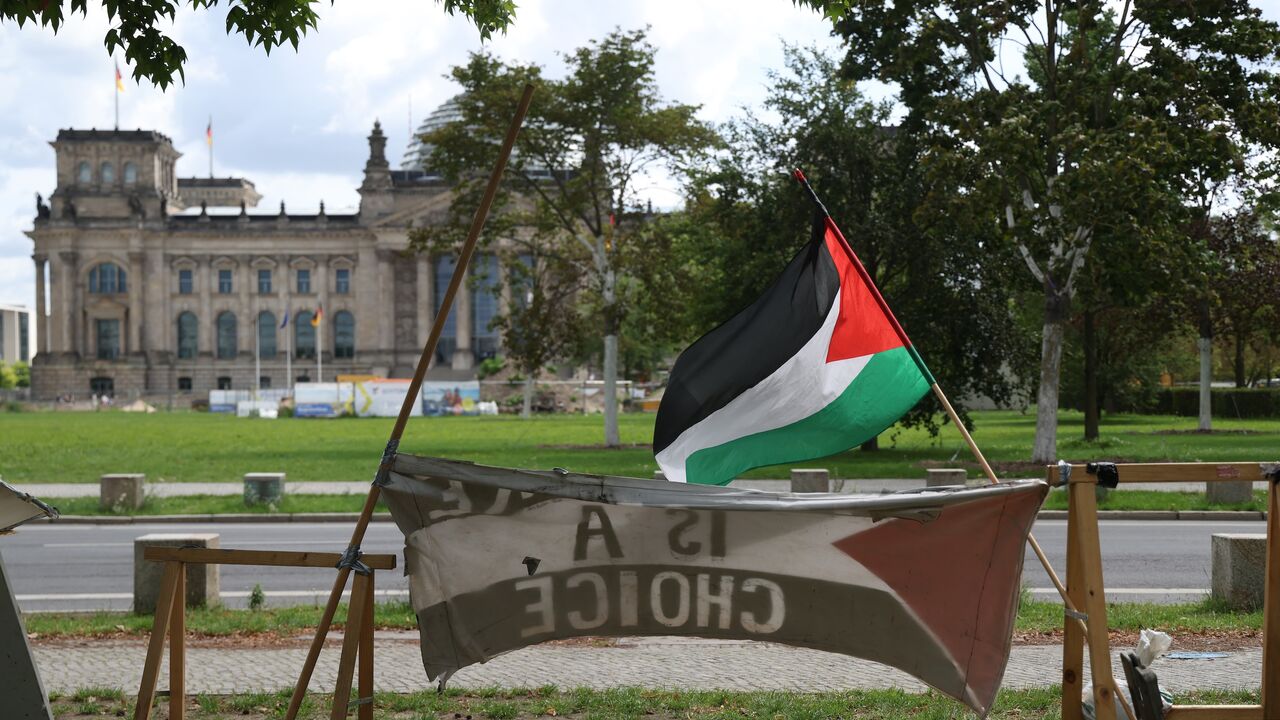 Palestinian flags fly across from the Reichstag at a pro-Palestine activists camp on July 29, 2025, in Berlin, Germany. 