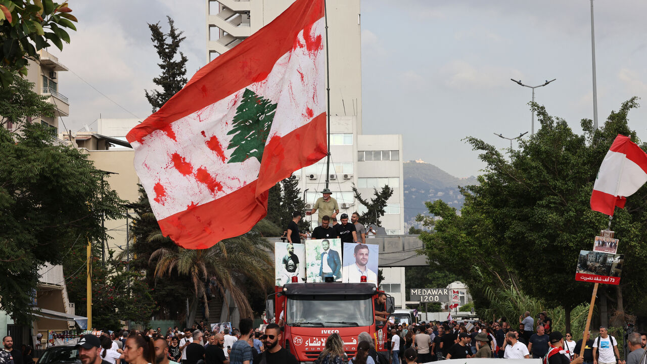 Lebanese demonstrators march during a gathering to honour the victims of the catastrophic port explosion in 2020 and to call for accountability for the blast, in Beirut on August 4, 2025. Lebanese President Joseph Aoun on August 4, vowed justice and accountability five years after a catastrophic explosion at Beirut's port, as the investigating judge finished questioning defendants, a judicial official said. (Photo by ANWAR AMRO / AFP) (Photo by ANWAR AMRO/AFP via Getty Images)