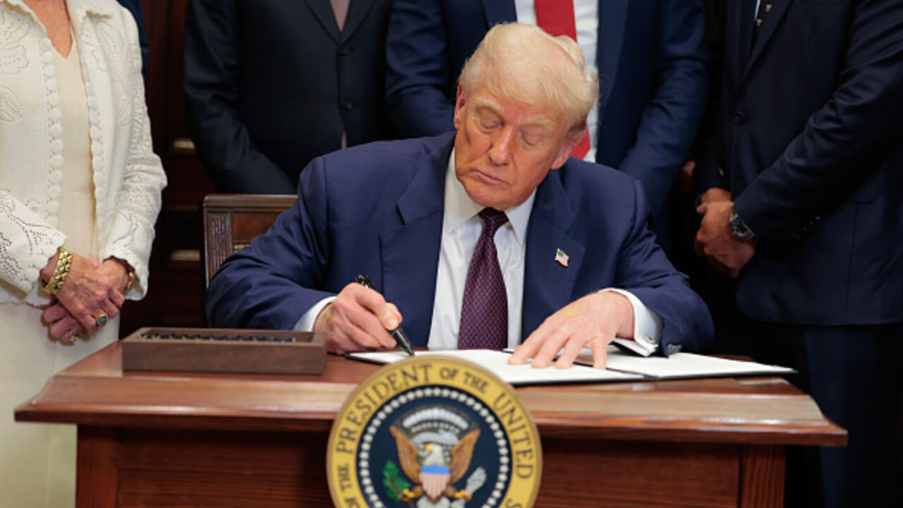 WASHINGTON, DC - JULY 31: U.S. President Donald Trump signs an executive order in the Roosevelt Room of the White House on July 31, 2025 in Washington, DC. Trump signed a series of orders that will expand on his council on sports, fitness and nutrition, including by reviving the Presidential Fitness Test in public schools. (Photo by Anna Moneymaker/Getty Images)