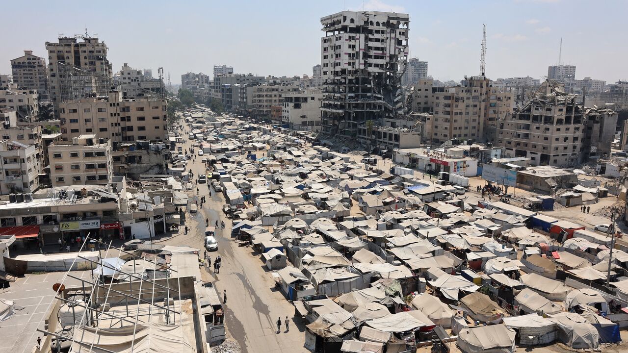 Tents housing displaced Palestinians line a street in Gaza City, Aug. 18, 2025.