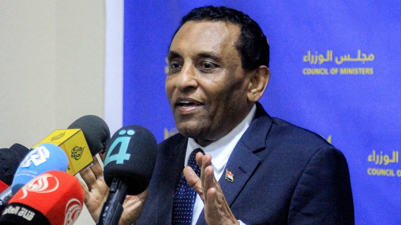 Sudan's Prime Minister Kamil Idris speaks to reporters in Khartoum, on Aug. 26, 2025.