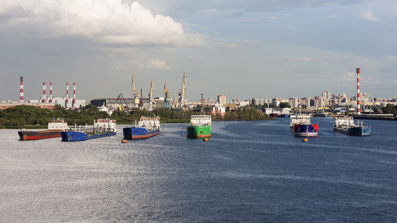 Oil tankers and cranes at Merchants Harbor, Saint Petersburg, Russia.