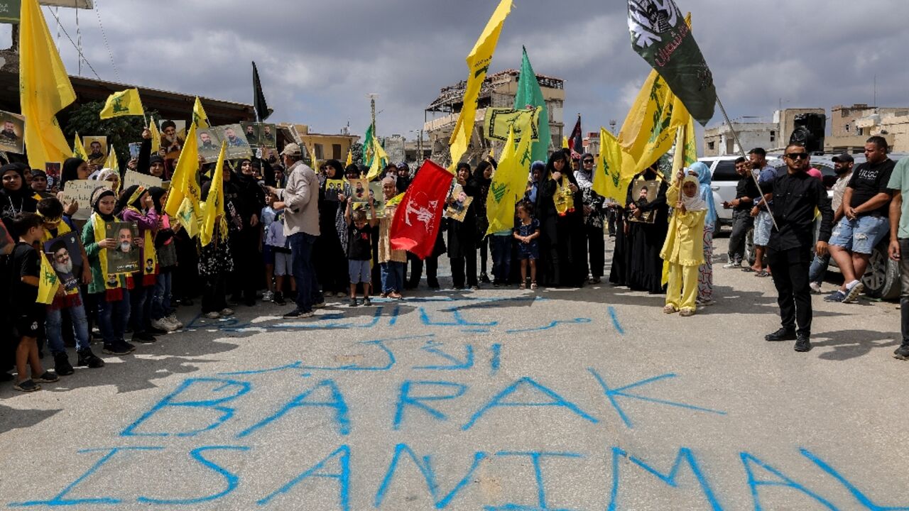 Hezbollah-supporting protesters hit back at US envoy Tom Barrack's warning to Lebanese journalists not to get "animalistic", prompting him to cancel a planned stop in the southern town of Khiam, state media reported.
