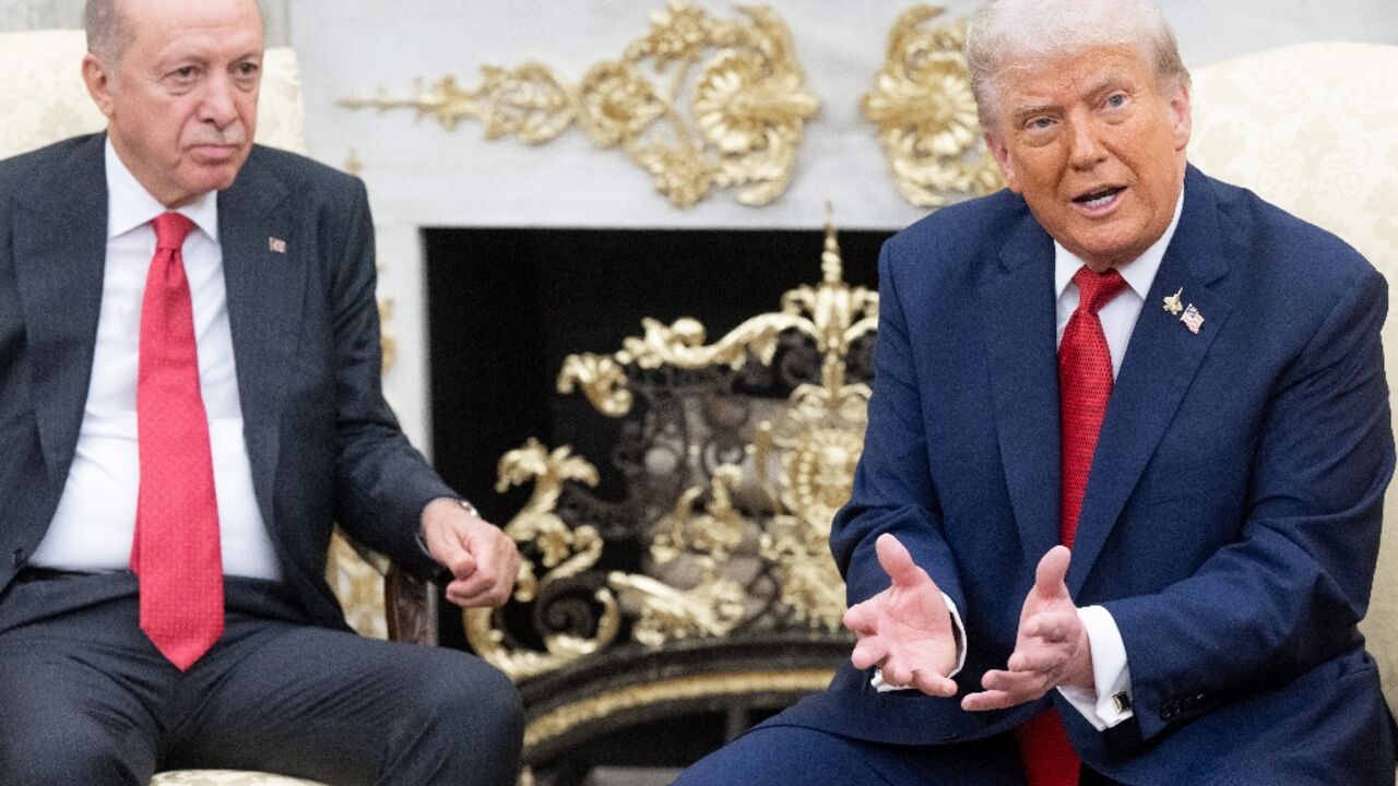 US President Donald Trump speaks to the press a he meets meets with Turkey's President Recep Tayyip Erdogan in the Oval Office of the White House in Washington, DC, on September 25, 2025.