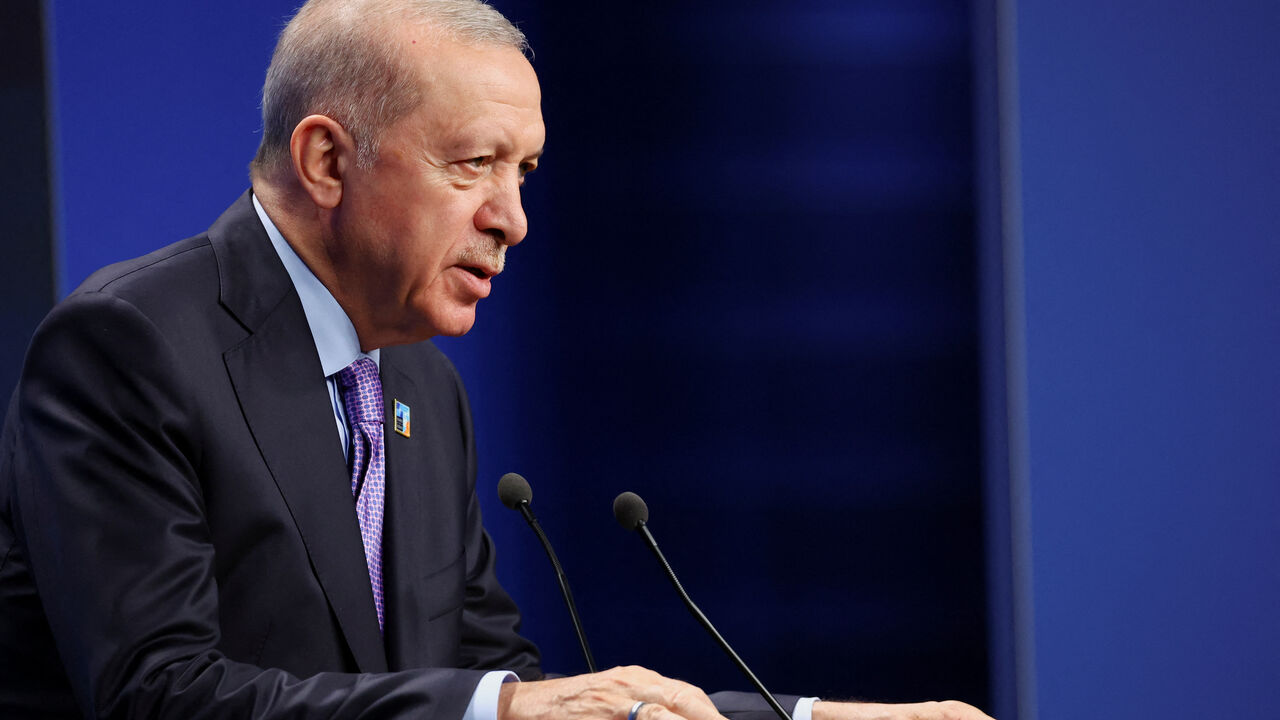 Turkey's President Tayyip Erdogan holds a press conference at the NATO summit in The Hague, Netherlands June 25, 2025. REUTERS/Piroschka Van De Wouw/File Photo