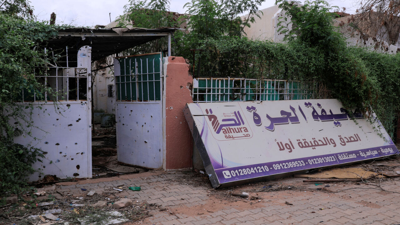 The entrance of the abandoned office of Al-Hurra newspaper, during a tour with Sudanese journalist Shamael Elnoor (not pictured), who returned to the ruins of a once-vibrant area housing newspaper publishing offices, highlighting concerns over an industry paralysed by the ongoing war, in the capital Khartoum, Sudan, August 23, 2025. REUTERS/El Tayeb Siddig