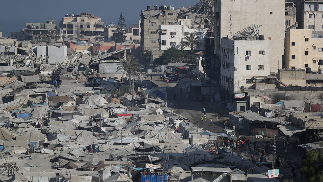 FILE PHOTO: Palestinians displaced by the Israeli military offensive take shelter in a tent camp, as Israeli forces escalate operations around Gaza City, in Gaza City, September 2, 2025. REUTERS/Dawoud Abu Alkas/File Photo