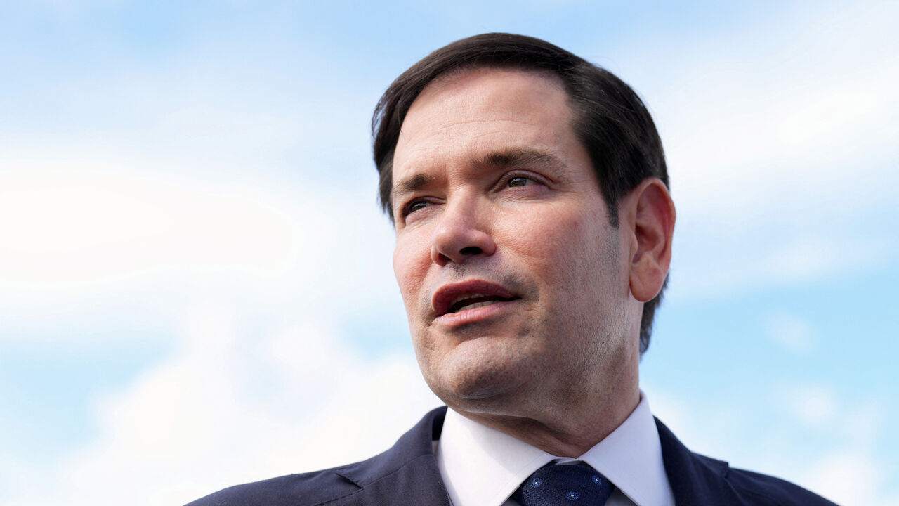 FILE PHOTO: U.S. Secretary of State Marco Rubio speaks to reporters before boarding his plane at Homestead Air Reserve Base in Homestead, Florida, U.S., en route to Mexico City, September 2, 2025. Jacquelyn Martin/Pool via REUTERS/ File Photo