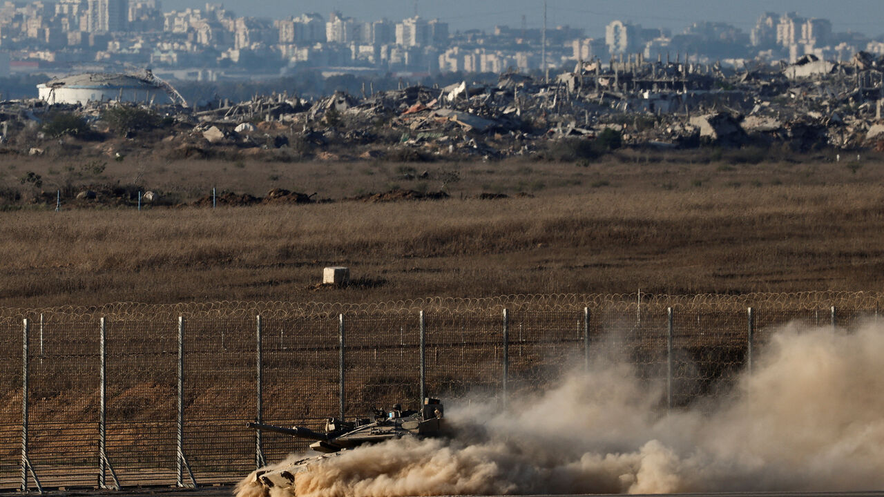 An Israeli tank manouvers on the Israeli side of the border with Gaza, in Israel September 8, 2025. REUTERS/Amir Cohen