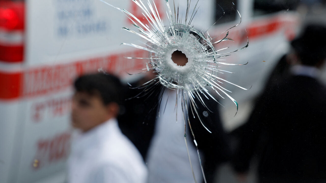 FILE PHOTO: A bullet hole on a bus is seen at the scene where a suspected shooting attack took place at the outskirts of Jerusalem, September 8, 2025 REUTERS/Ammar Awad/File photo