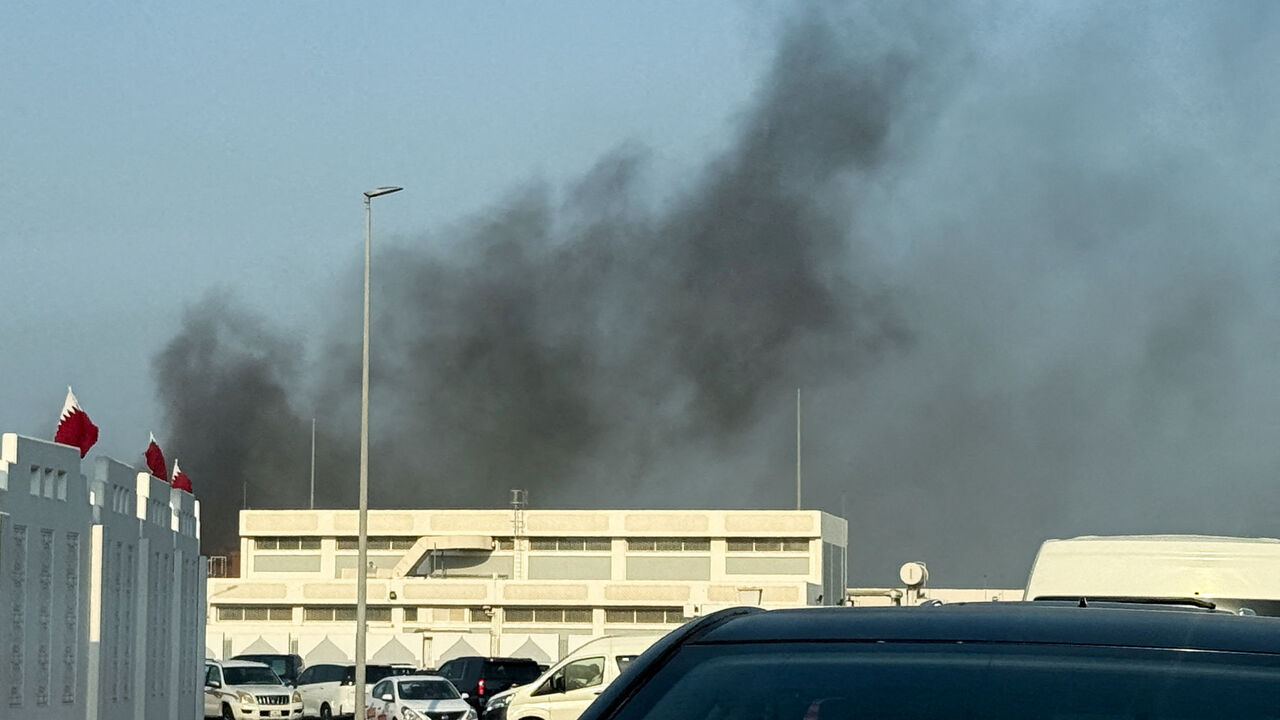 Smoke rises after several blasts were heard in Doha, Qatar, September 9, 2025. REUTERS/Ibraheem Abu Mustafa