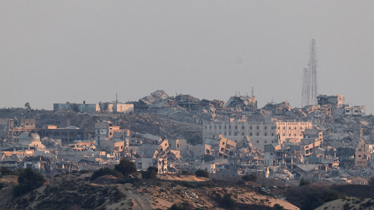 FILE PHOTO: Building lie in ruin in Gaza, as seen from the Israeli side of the border with Gaza, September 9, 2025. REUTERS/Amir Cohen/File Photo