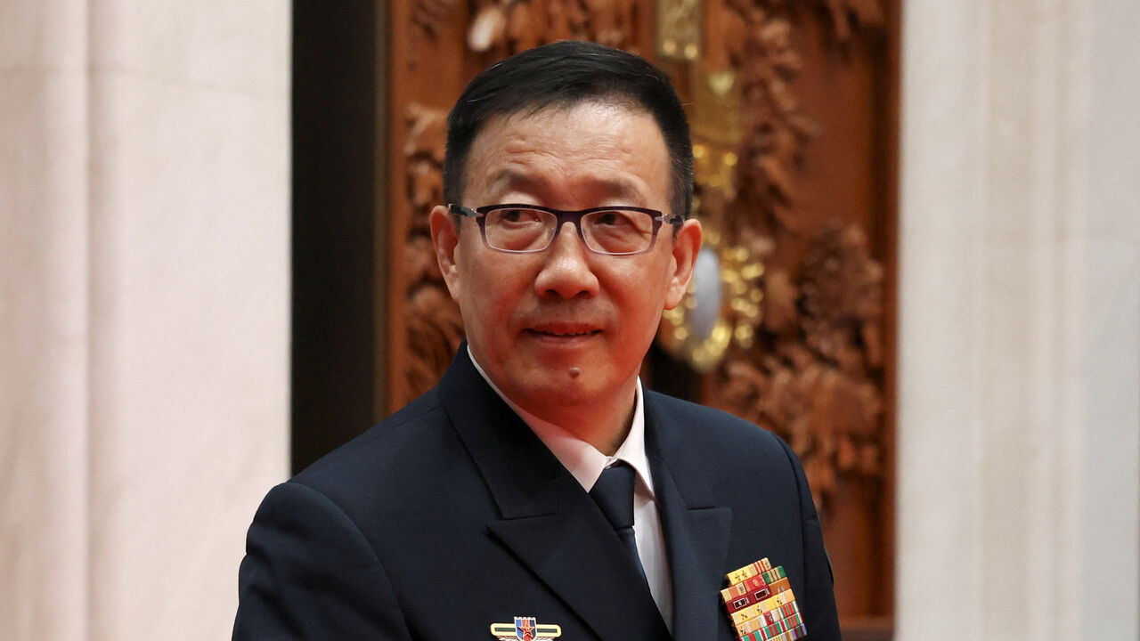 Chinese Defence Minister Dong Jun visits a meeting hall where the 2018 SCO Summit was held, at the Shanghai Cooperation Organisation (SCO) Defence Ministers' Meeting in Qingdao, Shandong province, China, June 26, 2025. REUTERS/Florence Lo/File Photo