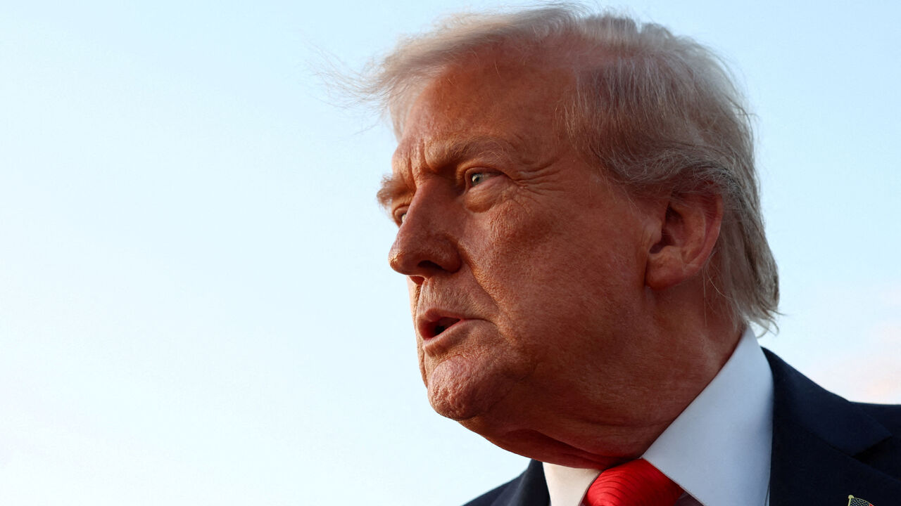 FILE PHOTO: U.S. President Donald Trump looks on as he speaks to the press at Joint Base Andrews in Maryland, U.S., September 7, 2025. REUTERS/Evelyn Hockstein/ File Photo