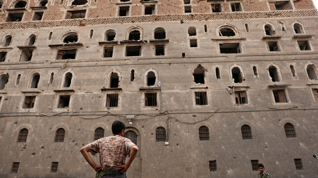 A museum official stands outside the damaged National Museum of Yemen building in the aftermath of Israeli airstrikes, in Sanaa, Yemen, September 11, 2025. REUTERS/Khaled Abdullah