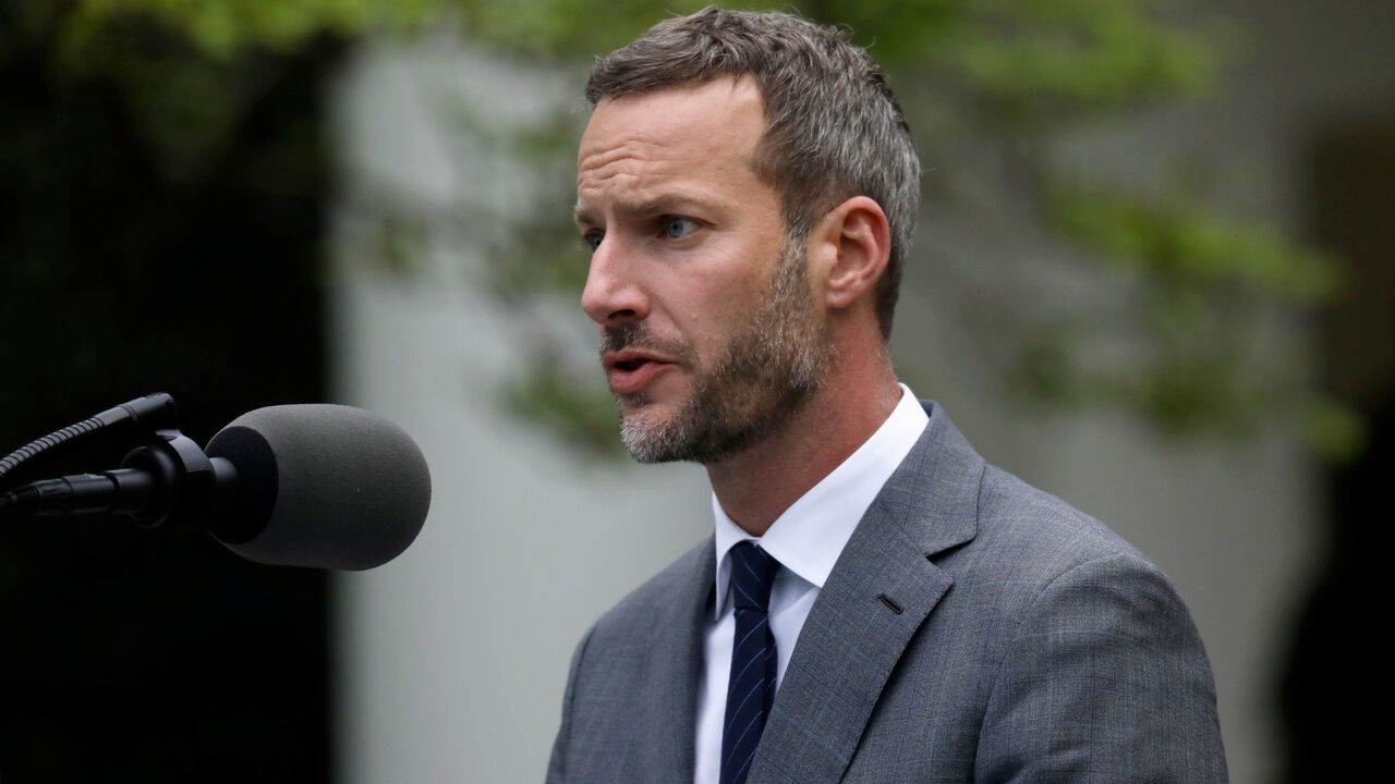 FILE PHOTO: Adam Boehler, the CEO of the U.S. International Development Finance Corporation, addresses the daily coronavirus task force briefing in the Rose Garden at the White House in Washington, U.S., April 14, 2020. REUTERS/Leah Millis/File Photo