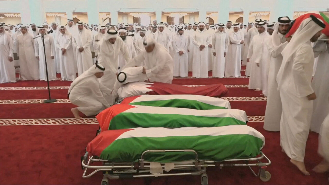 FILE PHOTO: People attend a funeral held for those killed by an Israeli attack in Doha, including Corporal Badr Saad Mohammed Al-Humaidi Al-Dosari, a member of the Internal Security Force, at the Sheikh Mohammed bin Abdul Wahhab Mosque in Doha, Qatar, September 11, 2025, in this screengrab obtained from a video feed. Qatar TV/Reuters TV via REUTERS./File Photo