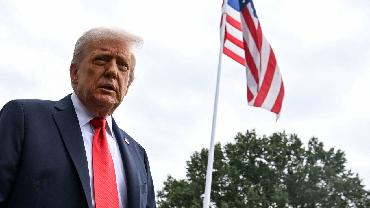 FILE PHOTO: U.S. President Donald Trump talks to the press on the South Lawn of the White House, in Washington, U.S., September 7, 2025. REUTERS/Annabelle Gordon/File Photo