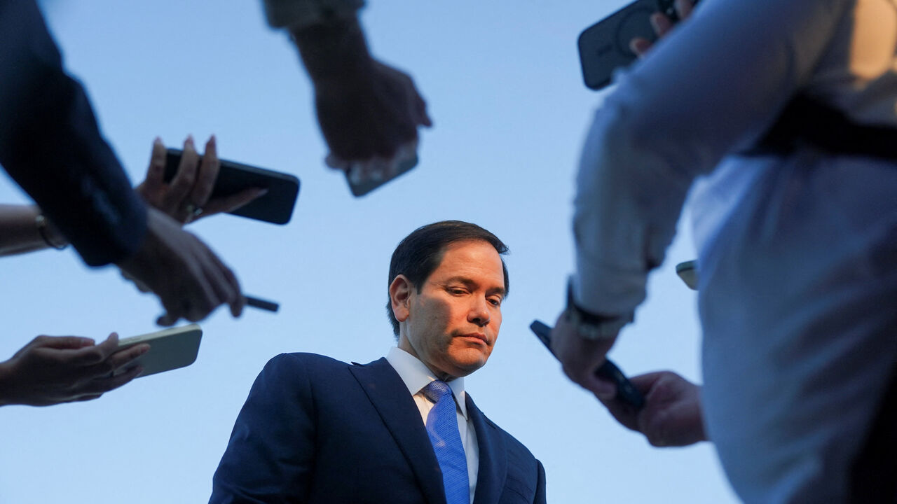 U.S. Secretary of State Marco Rubio listens as he speaks to media at Ben Gurion International Airport, as he departs Tel Aviv for Qatar following an official visit, near Lod, Israel, September 16, 2025. REUTERS/Nathan Howard/Pool