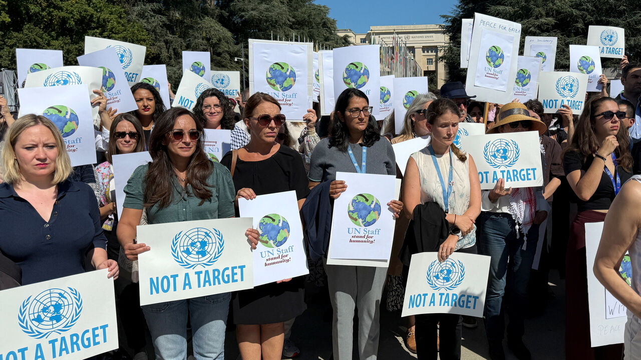 Staff of the United Nations agencies gather to denounce their colleagues killed in Gaza since October 2023 outside the European headquarters in Geneva, Switzerland, September 18, 2025.  REUTERS/Cecile Mantovani