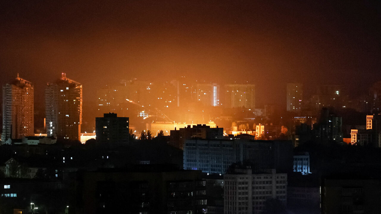 An explosion of a drone lights up the sky over the city during a Russian drone strike, amid Russia's attack on Ukraine, in Kyiv, Ukraine September 19, 2025. REUTERS/Gleb Garanich