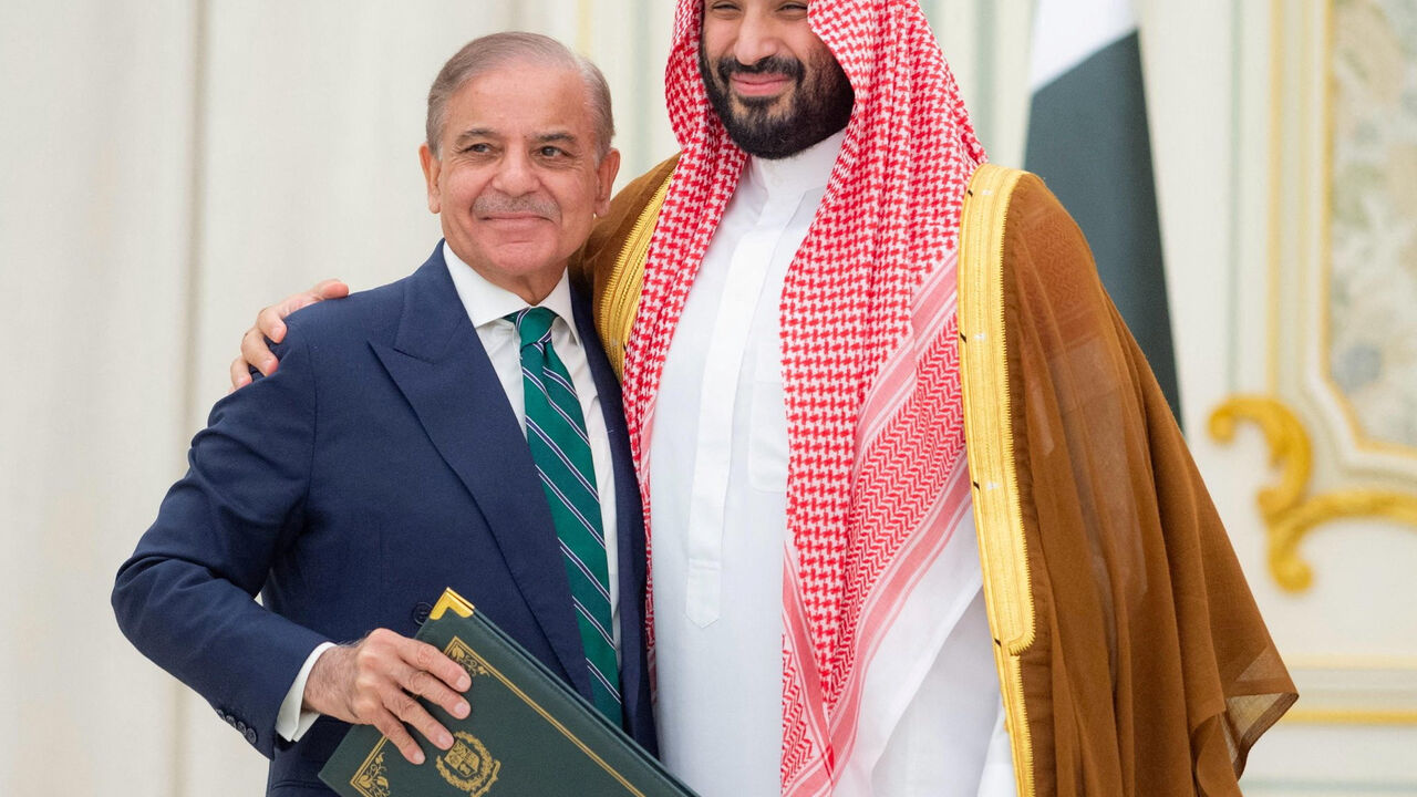 Saudi Crown Prince Mohammed bin Salman and Pakistan Prime Minister Shehbaz Sharif embrace each other on the day they sign a defence agreement, in Riyadh, Saudi Arabia, September 17, 2025. Saudi Press Agency/Handout via REUTERS