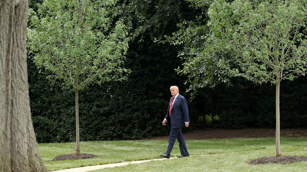 FILE PHOTO: U.S. President Donald Trump walks to board Marine One to depart for New Jersey, at the White House in Washington, D.C., U.S., August 1, 2025. REUTERS/Jonathan Ernst/File Photo